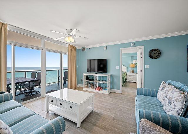 Blue Water Keyes 1003 - Oceanfront in Crescent Beach Section Winter Rental of Living Room showing the ocean in the background