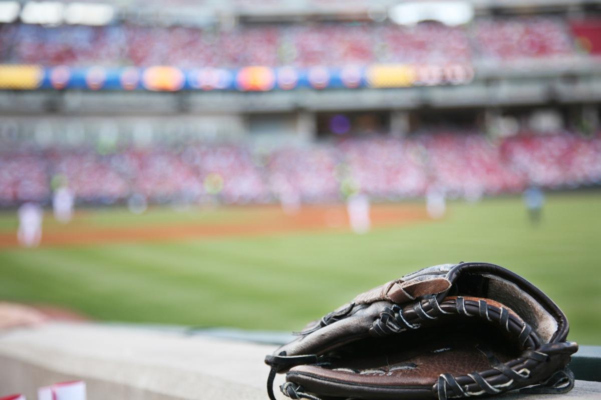 A picture of a baseball glove with the background in bokeh mode only focused on the glove.